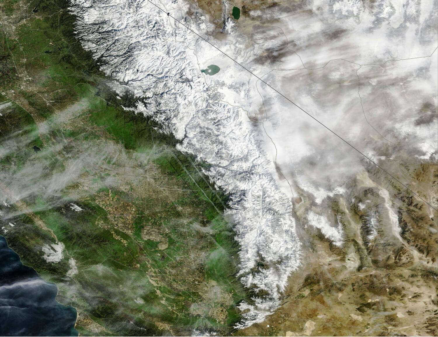 Dramatic satellite photos show California's mountains blanketed in snow after intense storms